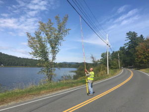 Measuring height of wires above road bed