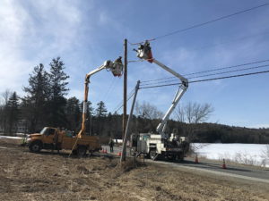 Eversource crews moving electric service to new pole near Post Pond, March 2020